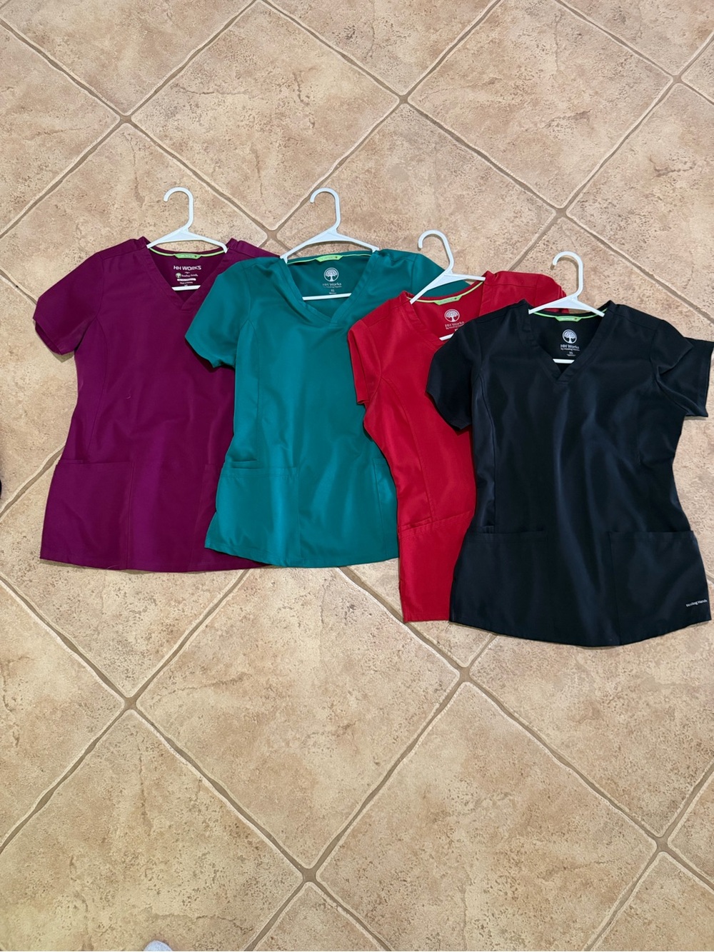healing hands Women's Scrub Tops in Plum, Teal, Red, and Black